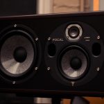 subwoofer vibrations through walls